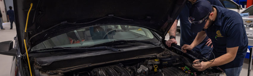 Florence-Darlington Technical College automotive student works to repair an automobile during class