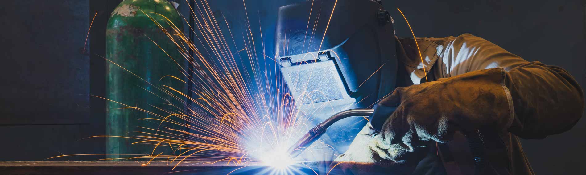 A welder working with MIG.