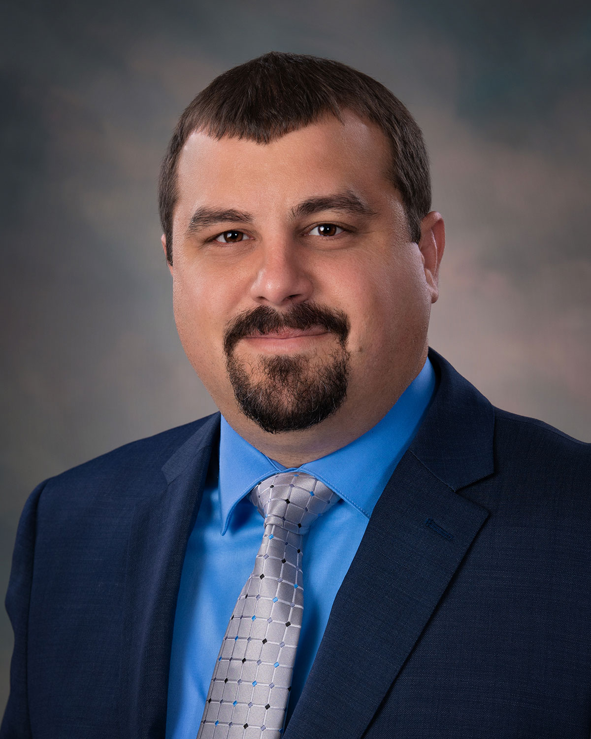A head shot of Andrew Golden.
